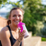 Woman drinking sports drink
