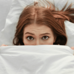 woman awake after bad dream